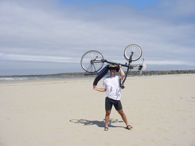 Bill carrying bike at South Jetty